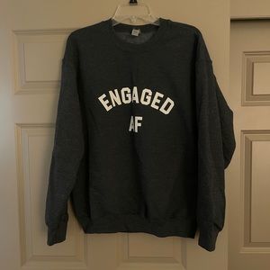 Sweatshirt with “Engaged AF printed”